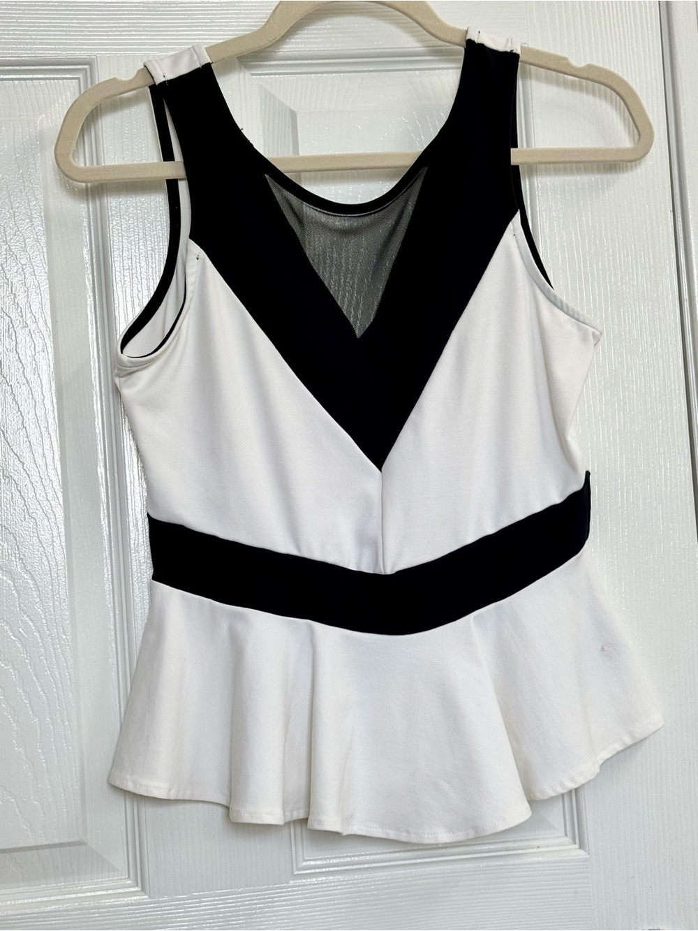 bebe Black and White V-Neck Peplum Tank